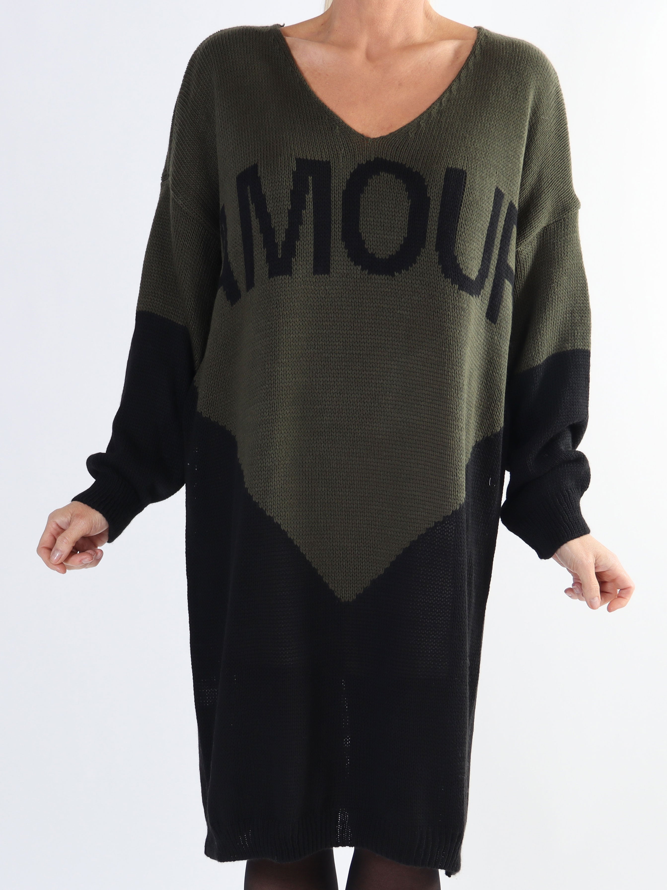 Palermo - Tvåfärgad stickad klänning i plus size med stående amour